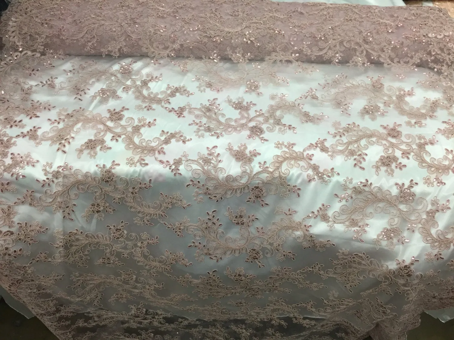 Mauve french corded design-embroider with sequins on a mesh lace fabric-prom-nightgown-decorations-sold by the yard.